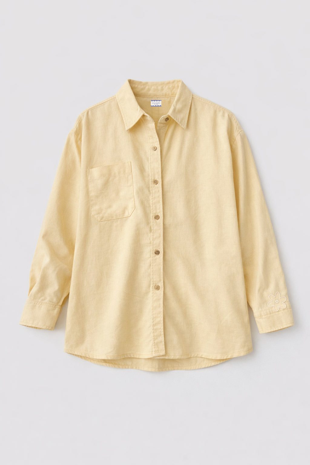 Camisa flor amarilla